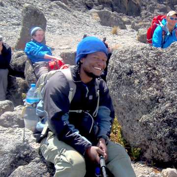 Godbless Swai - Travel Expert