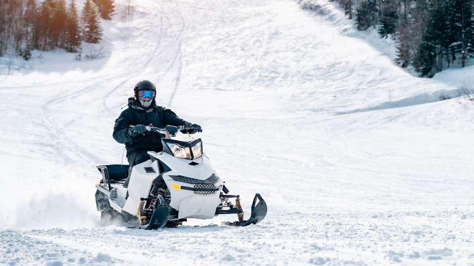 Snowmobiling Tours in Kuhmo