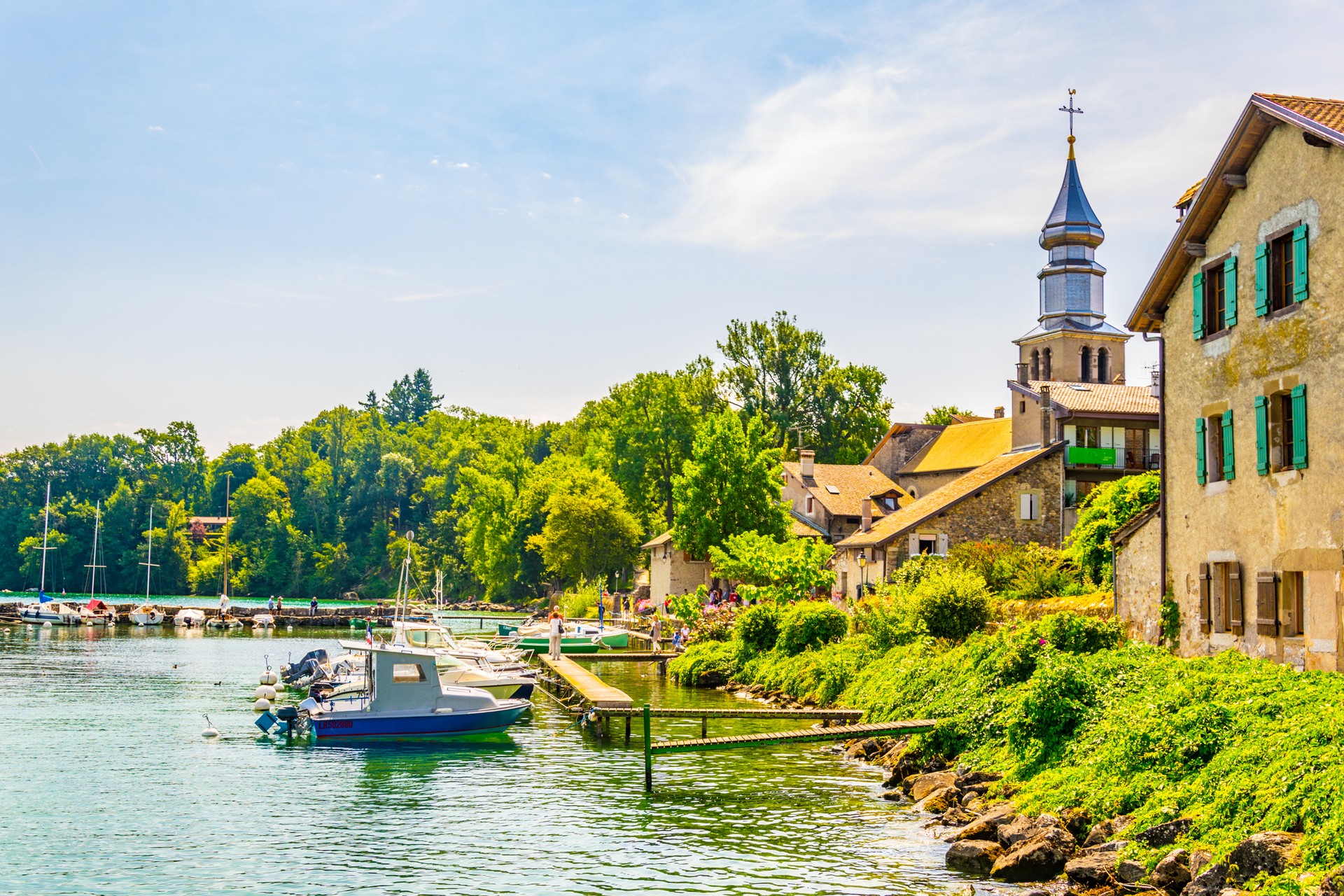 Instead of busy itinerary to Paris, you can alternatively take a quiet trip to the city of Yvoire in France during July. Cityscape of french city Yvoirem in France in July.