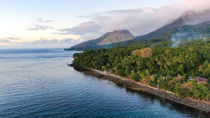 A view of the coastline and volcano at Camiguin Island.