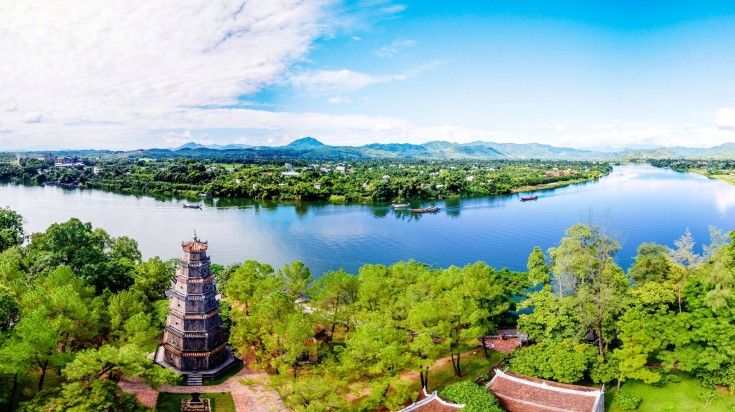 Head to the Thien Mu Pagoda and the river infront of it while spending 21 days in Vietnam.