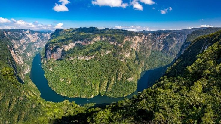View of Sumidero Canyon on a clear day in Chiapas on your 12 days in Mexico View of Sumidero Canyon on a clear day in Chiapas on your 12 days in Mexico