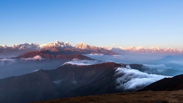 You get a panoramic view of the Himalayas including Mount Everest from Pikey Peak. An aerial view of Pikey Peak and surrounding mountains in the Himalayas.