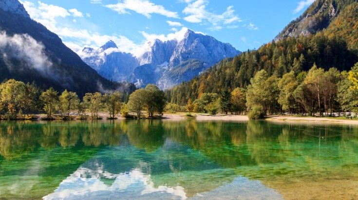 Hike the beautiful Kranjska Gora and see amazing scenery and gorgeous lakes. See amazing scenery at Kranjska Gora while spending 5 days in Slovenia.
