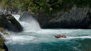 A raft with adventurers on the Petrohue River in Argentina