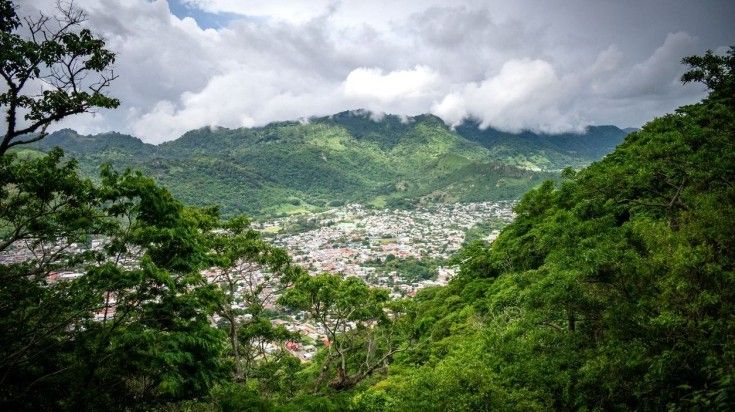 A view of the city of Jinotega nestled in the mountains of northern Nicaragua. Visit the highland town of Jinotega during your time in Nicaragua.