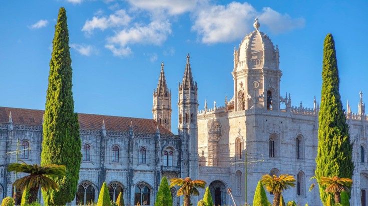 The view of Jerónimos Monastery in Lisbon on a clear day during your 13 days in Portugal. The view of Jerónimos Monastery in Lisbon on a clear day during your 13 day