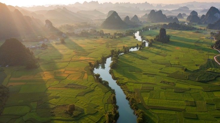 See rice fields in the north while spending 8 days in Vietnam.