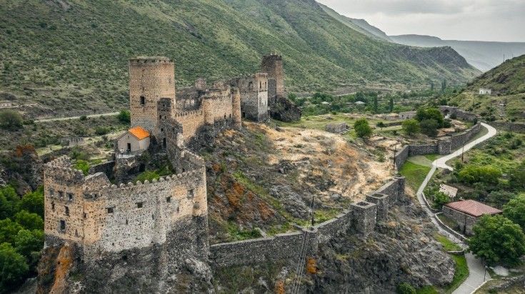 An aerial view of Khertvisi Fortress in southern Georgia. It is one of the oldest fortresses in the country. Go on a tour of Khertvisi Fortress during your 8 days in Georgia.