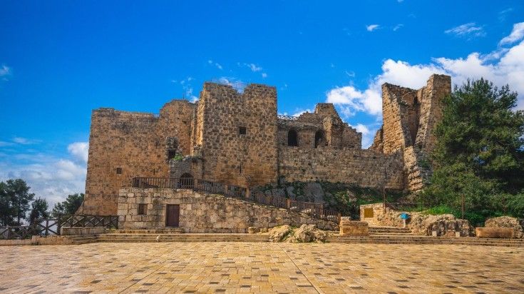 The front view of Ajloun Castle on a clear day in Jordan.