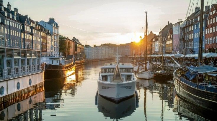 A cruise in Copenhagen during sunset in Norway.
