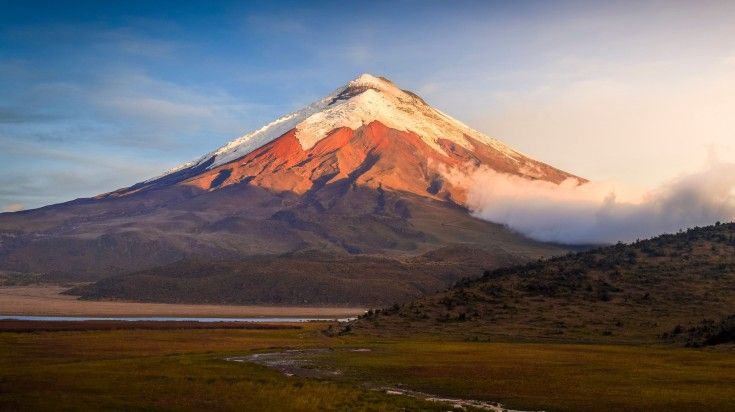 Panoramic view of Cotopaxi mountain during dusk in Ecuador.