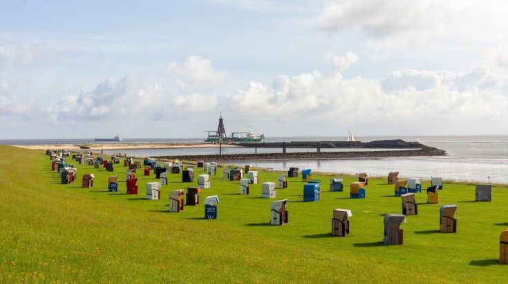 A panoramic view of beach cabins in the harbor of Cuxhaven.