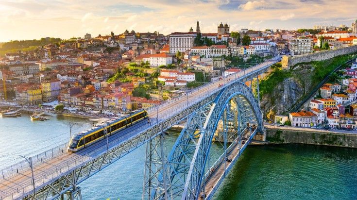 Train leave the historic Porto city fro Douro Valley