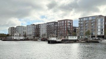 A row of residential building on the waterfront in Denmark.