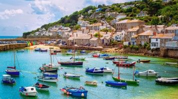 Mousehole, a historic fishing village in West Cornwall, is located just three miles west of Penzance. Visit fishing port of Mousehole village when in England for 8 days