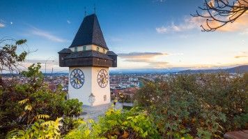 The iconic Uhrturm is a symbol of the city, perched on a hill.