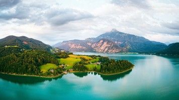 Aerial view showcasing the stunning Lake Mondsee and Schafberg Mountain in
