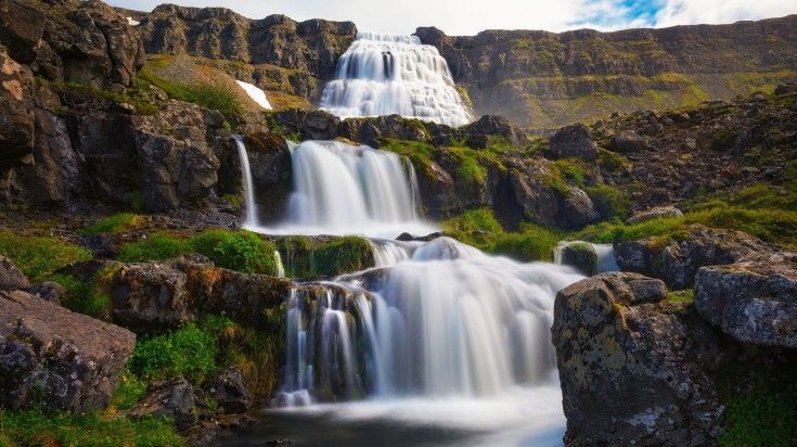 Witness the cascading falls of Dynjandi.