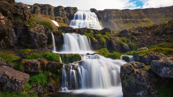 Witness the stunning Dynjandi waterfall while spending 5 days in Iceland.