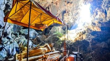Explore the Tham Pou Kham Cave during your one week in Laos.