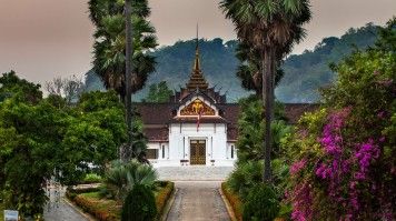 The Royal Palace, surrounded by tranquil gardens.