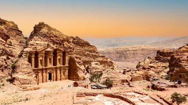 The Monastery or Ad Deir in Petra ruin with the ancient city of Nabatean kingdom at sunset in Jordan—one of the best places to visit in September.