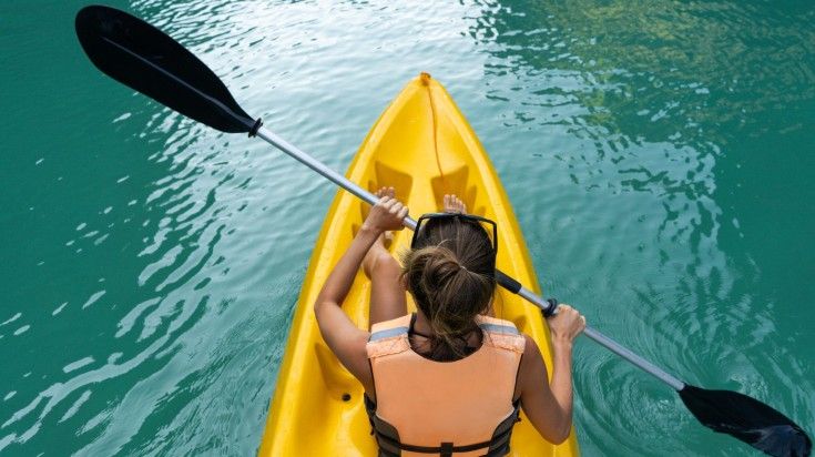 Top view of a woman kayaking in the Philippines.