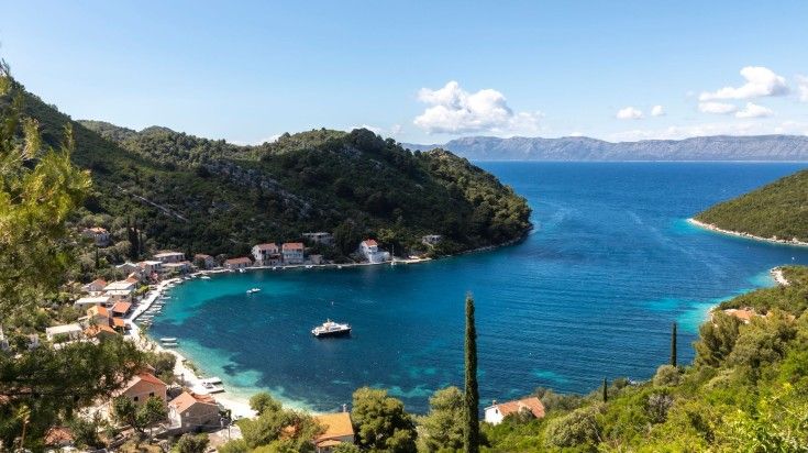 Panoramic view of Mljet National Park with a cruise sailing on a clear day. Panoramic view of Mljet National Park with a cruise sailing on a clear day.