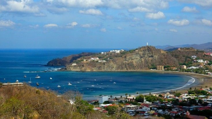 A sweeping view of San Juan de Sur and the Christ's statue A sweeping view of San Juan de Sur and the Christ's statue