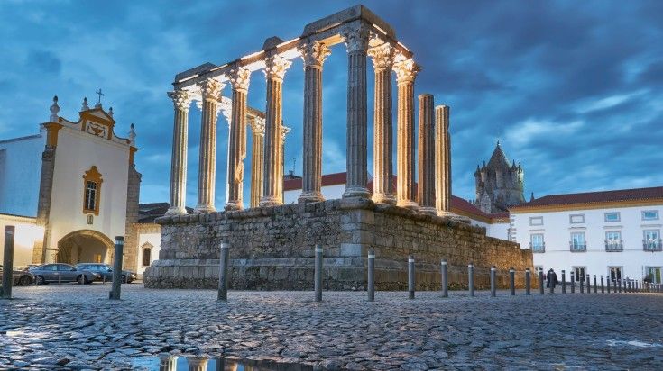 The Roman Temple in Evora is one of the greatest and best preserved roman temples in the Iberian Peninsula. Roman ruins in Evora in Portugal in the evening