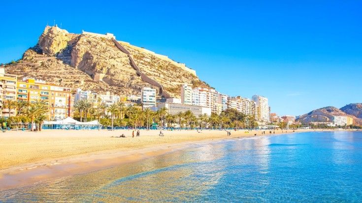 Postiguet beach and coastline in Alicante resort town.