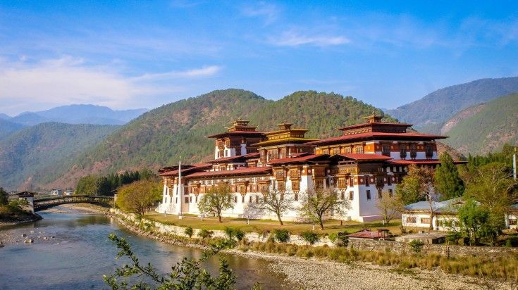 The view of beautiful Punakha Dzong Citadel on a clear day in Bhutan. The view of beautiful Punakha Dzong Citadel on a clear day in Bhutan.