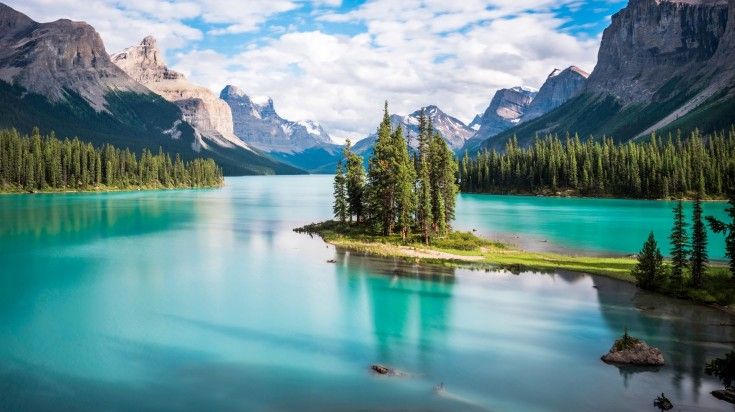 Spirit Island in Maligne Lake at sunset.