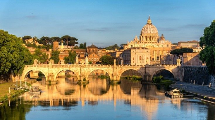 Sunrise landscape view in early morning of St. Peter's Basilica in Rome. Sunrise landscape view in early morning of St. Peter's Basilica in Rome.