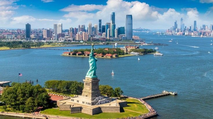 Panoramic aerial view of Statue of Liberty on a clear day in New York.