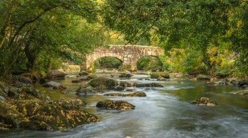 The meandering River Teign in Dartmoor National Park. The meandering River Teign in Dartmoor National Park.