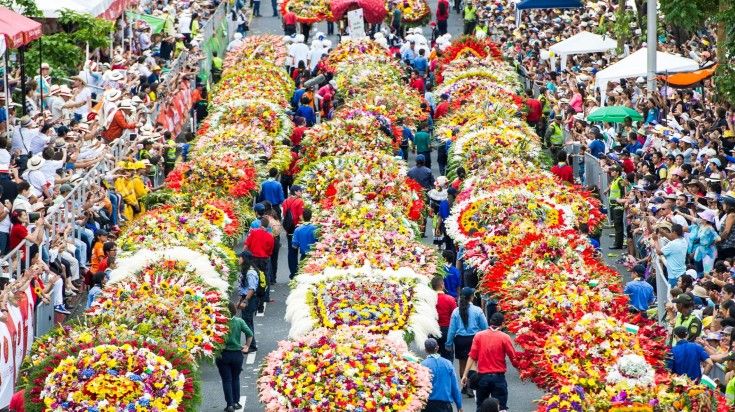 Watching flower parade in Medellin is a top thing to do in Colombia.