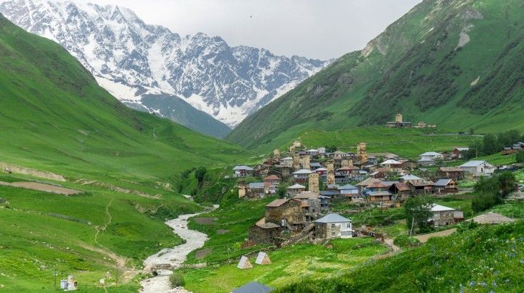 The view of Ushguli village in a gorge between mountains in Georgia.