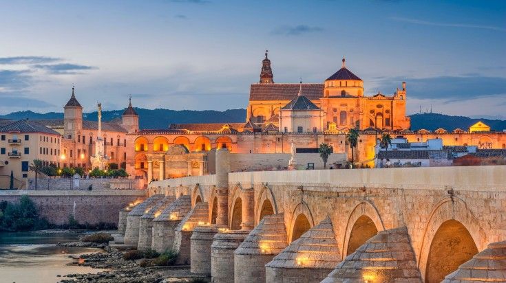 View of the Roman Bridge and Mosque Cathedral on the Guadalquivir River.