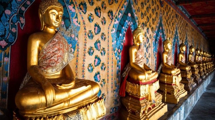 Visit a gallery with Golden Buddha at Wat Pho Temple in Bangkok while spending 13 days in Thailand.