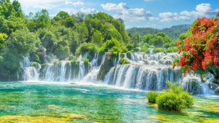 The view of waterfall in Krka National Park on a clear summer day in Croatia. The view of waterfall in Krka National Park on a clear summer day in Croati