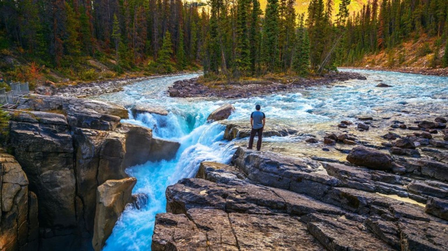 A hiker admiring the beauty of Jasper National Park during his 10 days in Canada trip.