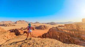 A woman taking the beauty of Wadi Rum during her 10 days in Jordan.