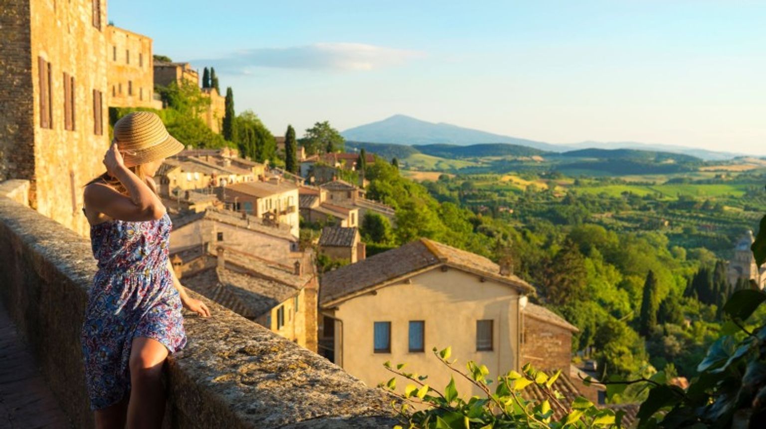 A girl looks at the beautiful landscape of Tuscany during her 11 days in Italy.