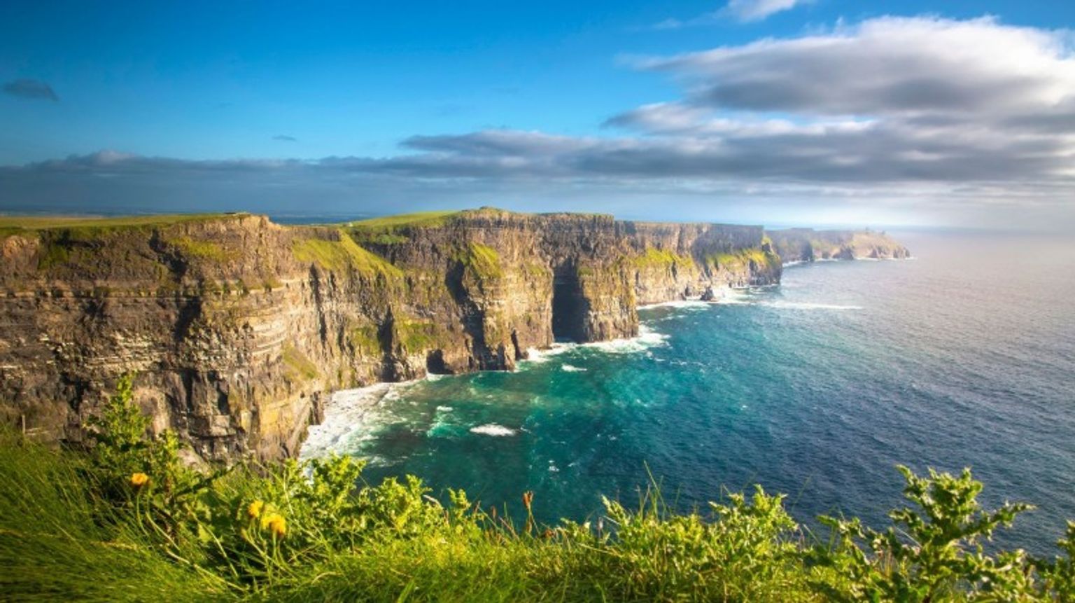Witness the dramatic cliffsides, crystal clear water and the astonishing natural beauty at the Cliffs of Moher. Visit the Cliffs of Moher while spending 11 days in Ireland.
