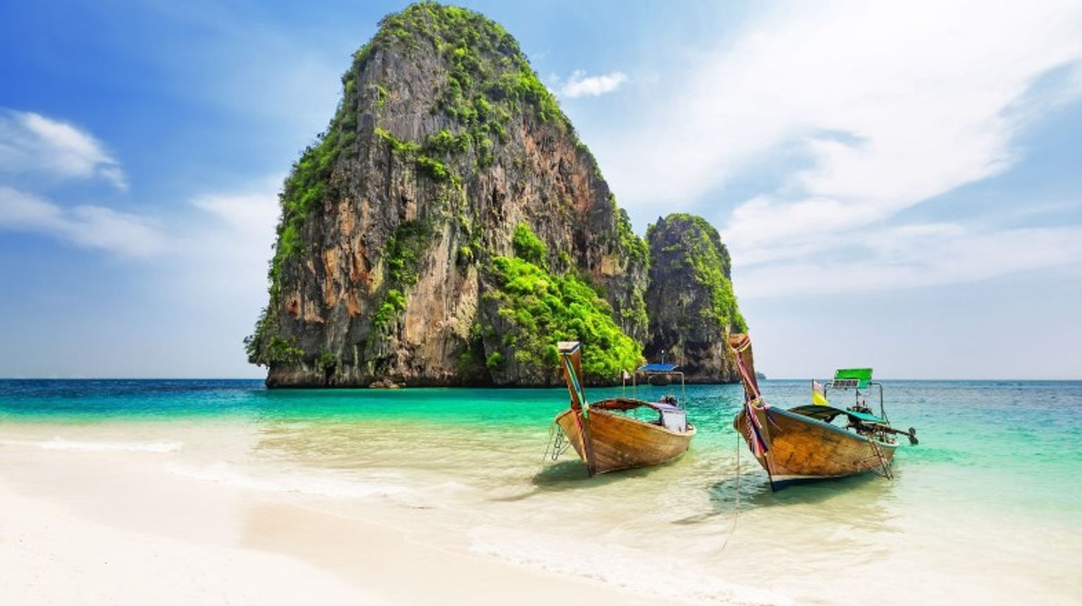 Get on a boat in Ao Phra Nang Beach while spending 13 days in Thailand.