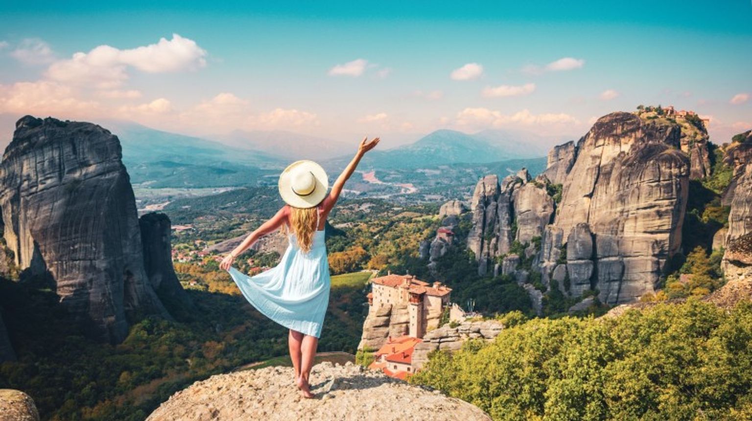 A tourist girl in Meteora during dusk on her 6 days in Greece.