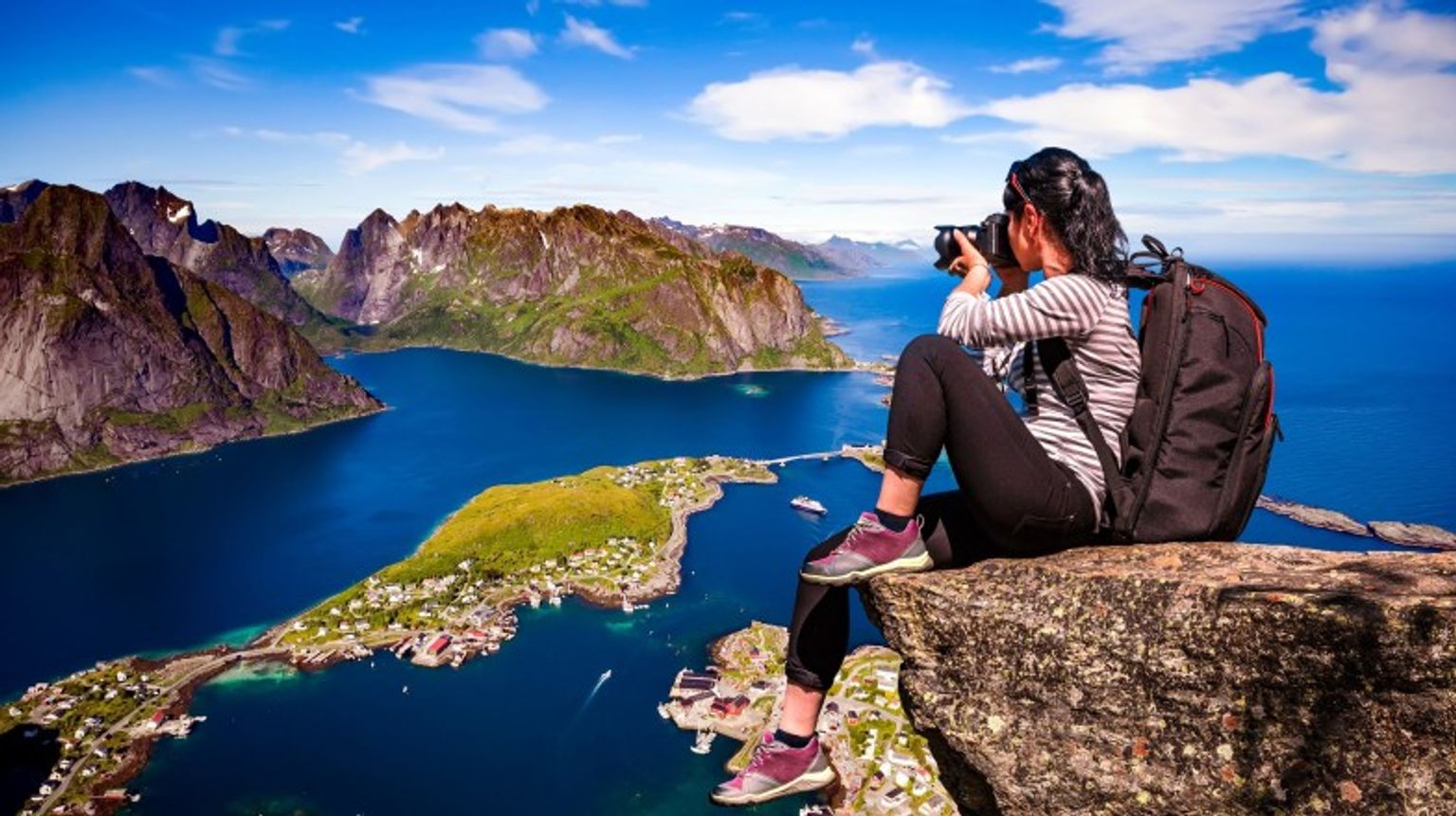 A girl capturing the beauty of Alesund from the top during her 8 days in Norway.