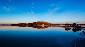 Experience the mirror-like affect of Salar de Uyuni in Bolivia